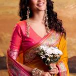 Skinny Yellow Patola Silk Saree with Luminous Blouse Piece