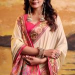 Phenomenal Beige Patola Silk Saree with Pulsating Blouse Piece