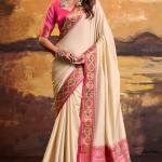 Phenomenal Beige Patola Silk Saree with Pulsating Blouse Piece