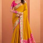 Splendiferous Yellow Patola Silk Saree with Precious Blouse Piece