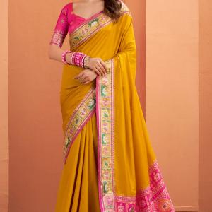 Splendiferous Yellow Patola Silk Saree with Precious Blouse Piece
