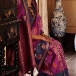 Moiety Wine Soft Banarasi Silk Saree With Fugacious Blouse Piece