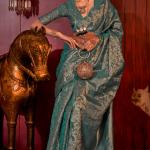 Stunning Rama Soft Banarasi Silk Saree With Energetic Blouse Piece