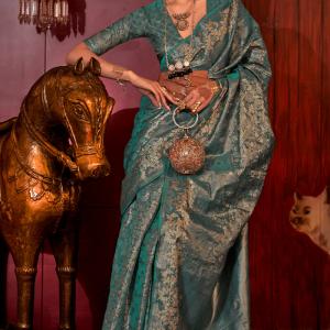 Stunning Rama Soft Banarasi Silk Saree With Energetic Blouse Piece