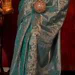 Stunning Rama Soft Banarasi Silk Saree With Energetic Blouse Piece