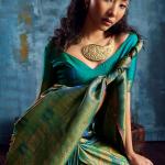 Pleasant Rama Kanjivaram Silk Saree With Stunning Blouse Piece