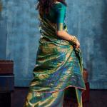 Pleasant Rama Kanjivaram Silk Saree With Stunning Blouse Piece