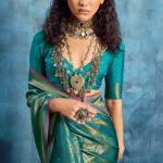 Resonant Green Kanjivaram Silk Saree With Entrancing Blouse Piece