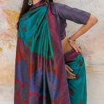 Eloquence Rama Kanjivaram Silk Saree With Divine Blouse Piece