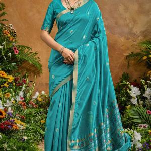 Redolent Firozi Banarasi Tussar Silk Saree With Enigmatic Blouse Piece