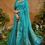 Redolent Firozi Banarasi Tussar Silk Saree With Enigmatic Blouse Piece