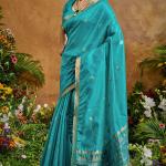 Redolent Firozi Banarasi Tussar Silk Saree With Enigmatic Blouse Piece