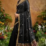 Opulent Black Banarasi Tussar Silk Saree With Nectarous Blouse Piece