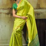 Ebullience Parrot Banarasi Handloom Silk Saree With Panoply Blouse Piece