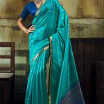 Marvellous Firozi Banarasi Handloom Silk Saree With Gratifying Blouse Piece