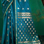 Glowing Rama Banarasi Satin Silk Saree With Prodigal Blouse