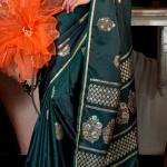 Stunning Dark Green Banarasi Satin Silk Saree With Precious Blouse