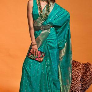 Fugacious Rama Soft Banarasi Silk Saree With Ineffable Blouse Piece