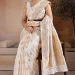 Dissemble Beige Pure Zari Weaving Banarasi Silk Saree With Girlish Blouse Piece