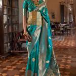 Sonorous Firozi Soft Banarasi Silk Saree With Charismatic Blouse Piece