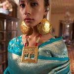 Sonorous Firozi Soft Banarasi Silk Saree With Charismatic Blouse Piece