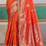 Proficient Orange Pure Zari Weaving Banarasi Silk Saree With Fancy Lace Border