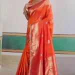 Proficient Orange Pure Zari Weaving Banarasi Silk Saree With Fancy Lace Border