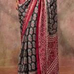 Desuetude Black Ajrakh Printed Satin Silk Saree With Glorious Blouse Piece
