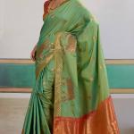 Engrossing Sea Green Pure Zari Weaving Banarasi Silk Saree With Efflorescence Blouse Piece