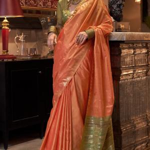 Unique Orange Soft Banarasi Silk Saree With Intricate Blouse Piece