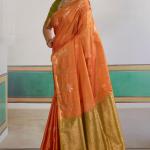 Seraphic Orange Banarasi Tussar Silk Saree With Extraordinary Blouse Piece