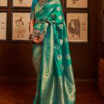 Pleasant Rama Kanjivaram Silk Saree With Ravishing Blouse Piece