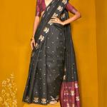Twirling Black Soft Banarasi Silk Saree With Admirable Blouse Piece