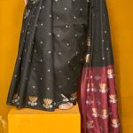 Twirling Black Soft Banarasi Silk Saree With Admirable Blouse Piece