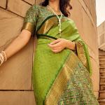 Ornate Green Patola Silk Saree with Tremendous Blouse Piece