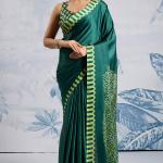 Elision Dark Green Ajrakh Printed Satin Silk Saree With Desiring Blouse Piece