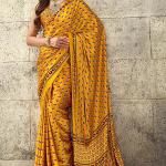 Gratifying Mustard Ajrakh Printed Satin Silk Saree With Enthralling Blouse Piece