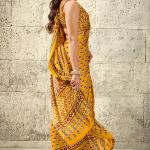 Gratifying Mustard Ajrakh Printed Satin Silk Saree With Enthralling Blouse Piece