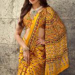 Gratifying Mustard Ajrakh Printed Satin Silk Saree With Enthralling Blouse Piece