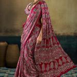 Mellifluous Dark Pink Ajrakh Printed Satin Silk Saree With Serendipity Blouse Piece
