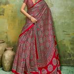 Staggering Red Ajrakh Printed Satin Silk Saree With Splendorous Blouse Piece