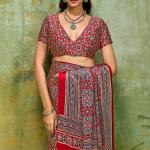 Staggering Red Ajrakh Printed Satin Silk Saree With Splendorous Blouse Piece
