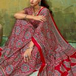 Staggering Red Ajrakh Printed Satin Silk Saree With Splendorous Blouse Piece