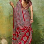 Staggering Red Ajrakh Printed Satin Silk Saree With Splendorous Blouse Piece