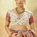 Glamorous Beige Pashmina Saree With Charming Blouse Piece