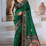 Seraphic Dark Green Patola Silk Saree with Extraordinary Blouse Piece