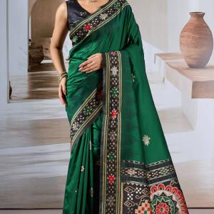 Seraphic Dark Green Patola Silk Saree with Extraordinary Blouse Piece