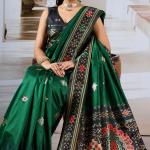 Seraphic Dark Green Patola Silk Saree with Extraordinary Blouse Piece