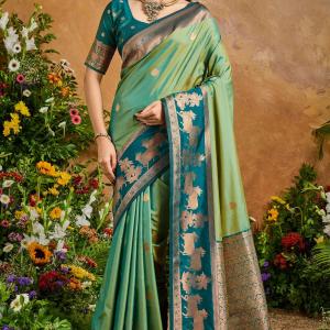 Fugacious Green Soft Banarasi Silk Saree With Unique Blouse Piece