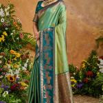 Fugacious Green Soft Banarasi Silk Saree With Unique Blouse Piece